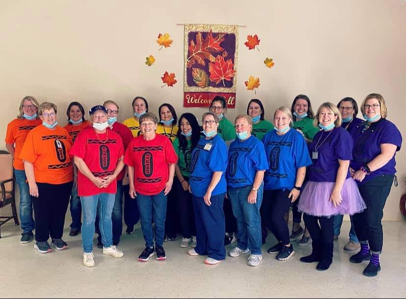 Vibrant senior living at Park View Haven. Engaged residents and staff in a warm, caring environment.